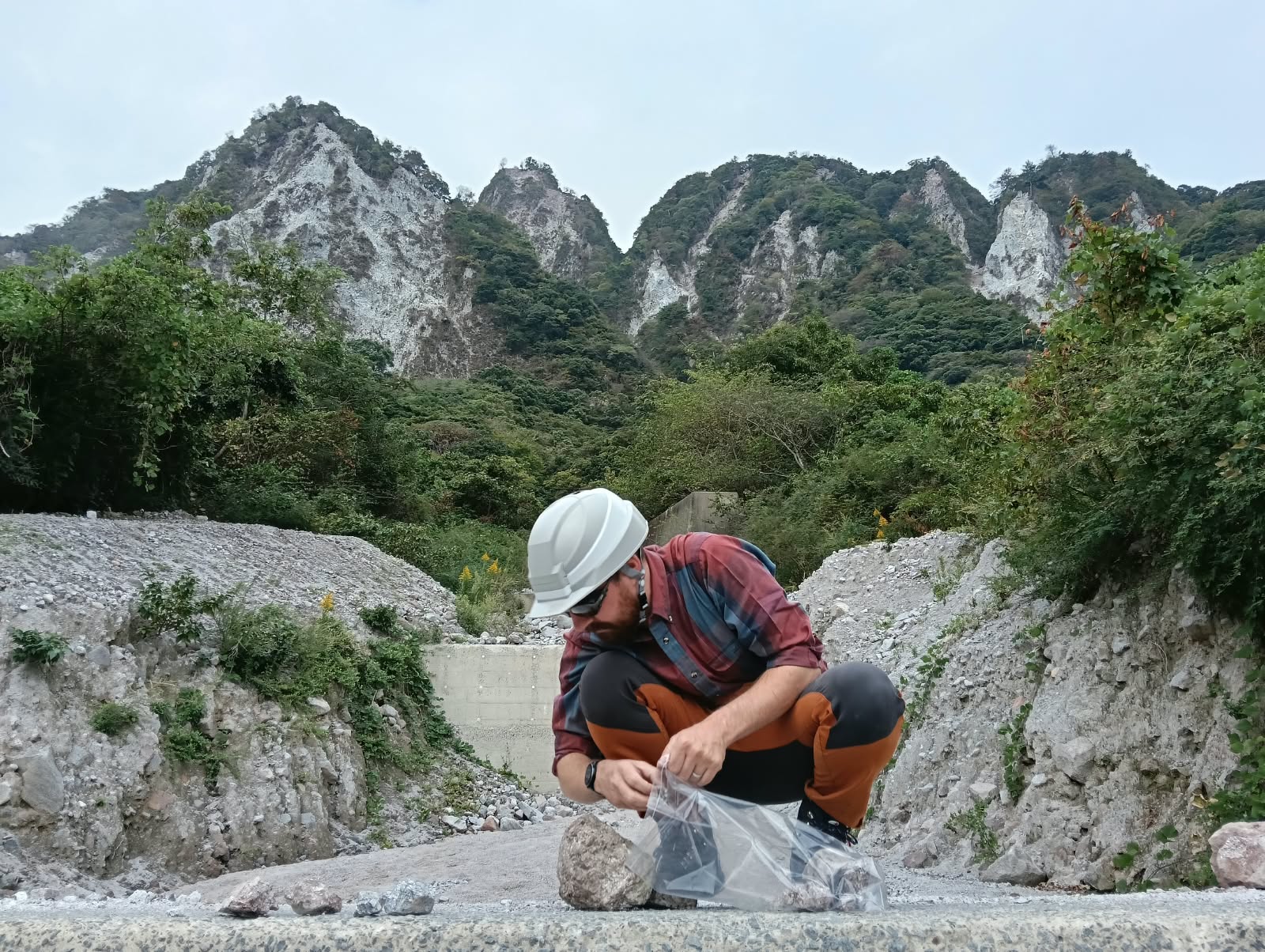 Collecting samples from Mayuyama volcano, Japan