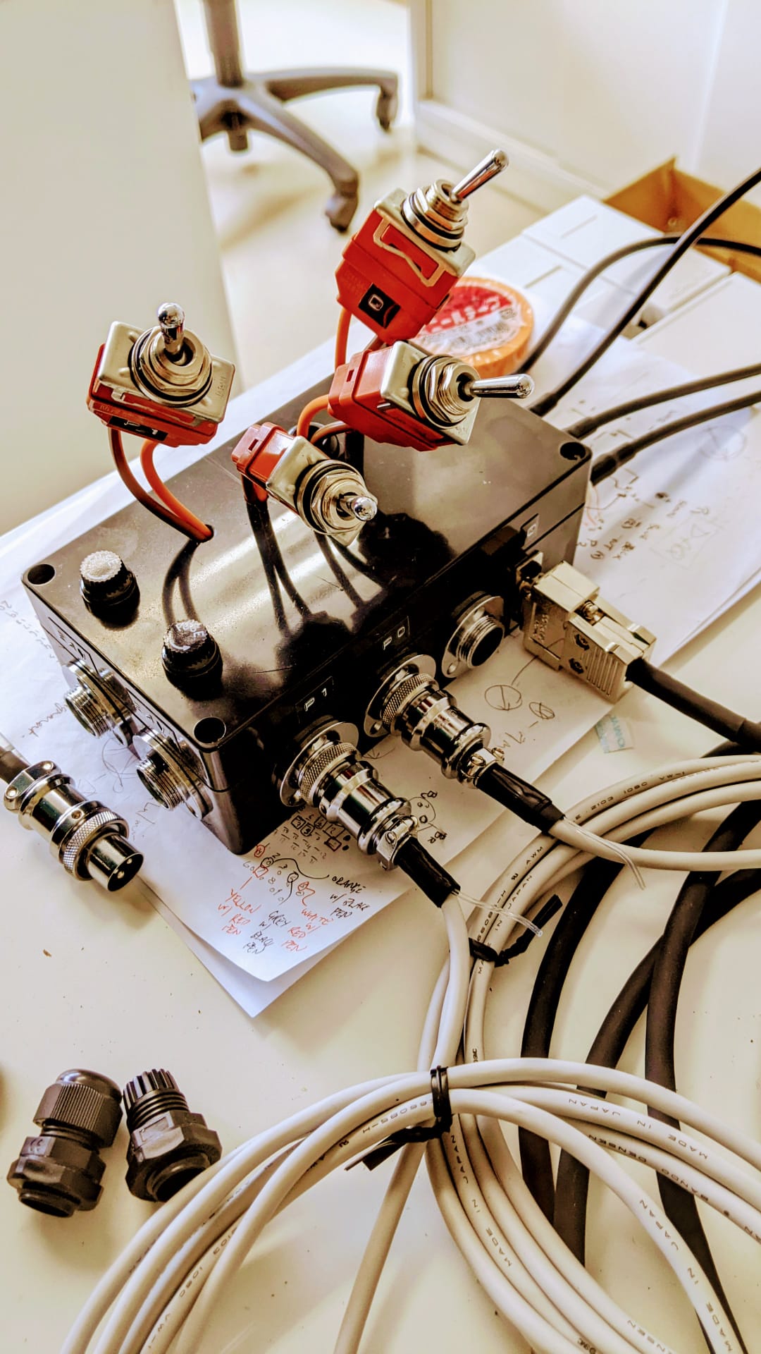 A homemade junction box that reads and powers sensors attached to a permeameter